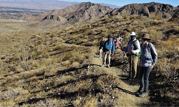 Masked community scientists on the hiking trail