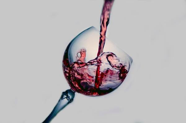 Red wine being poured into glass